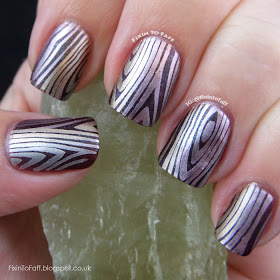 Metallic wood grain nail art using the stamping gradient technique.