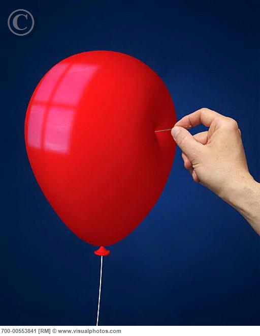 hand_poking_balloon_with_pin_700-0055384