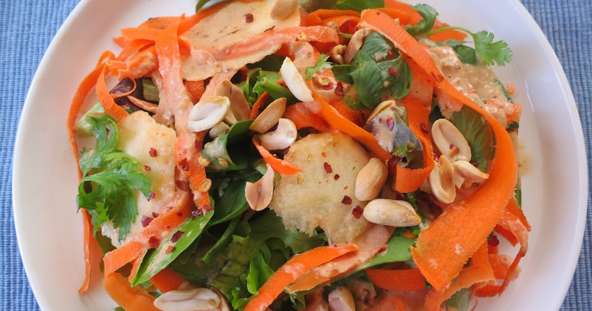 Mixed and Tossed Shaved carrot and Fuji apple salad with peanut butter