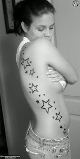 Tattooed Female with Sidebody Stars Tattoo