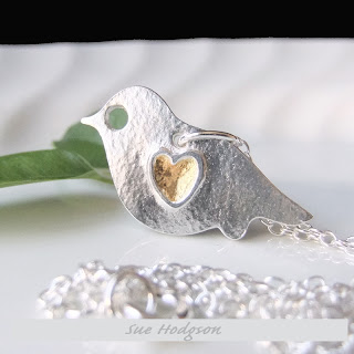 24 carat gold and silver bird pendant by sue hodgson