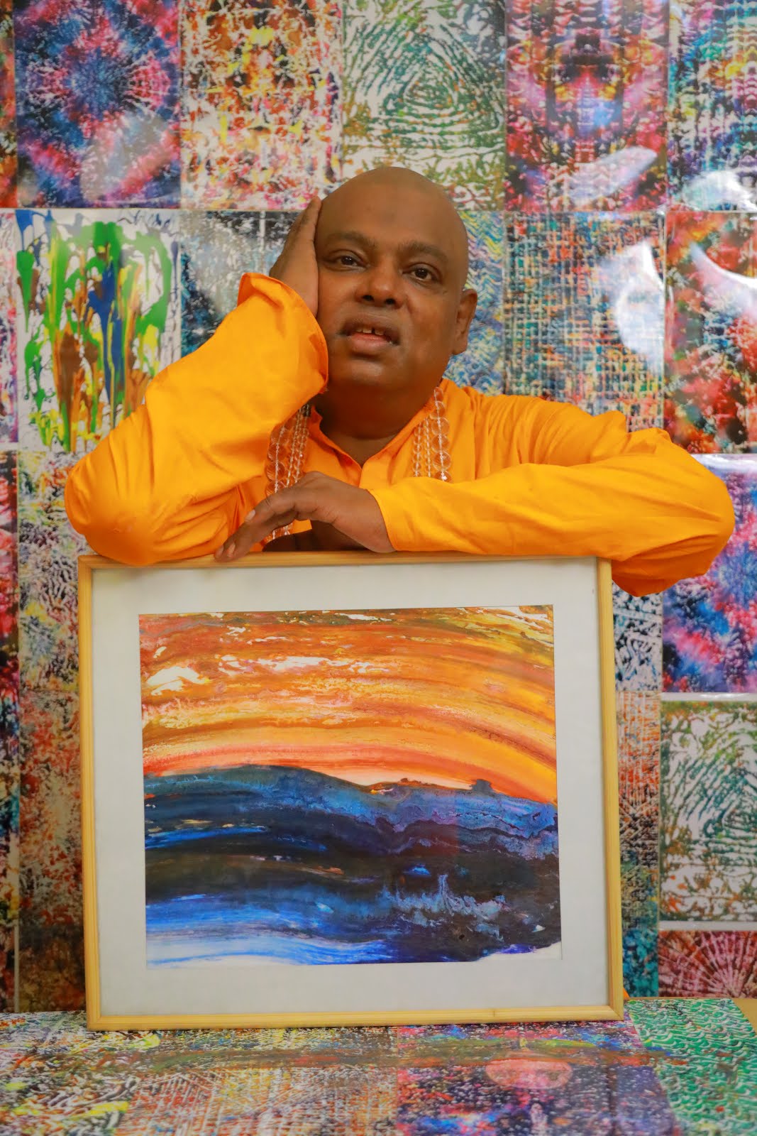 Parijoy Saha with the World's fastest landscape painting.