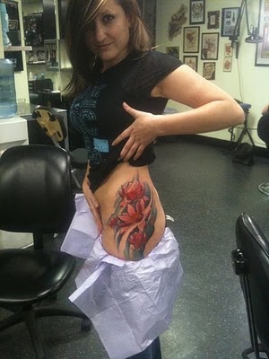 small tattoos for women on hip. Flower Tattoos On Hip