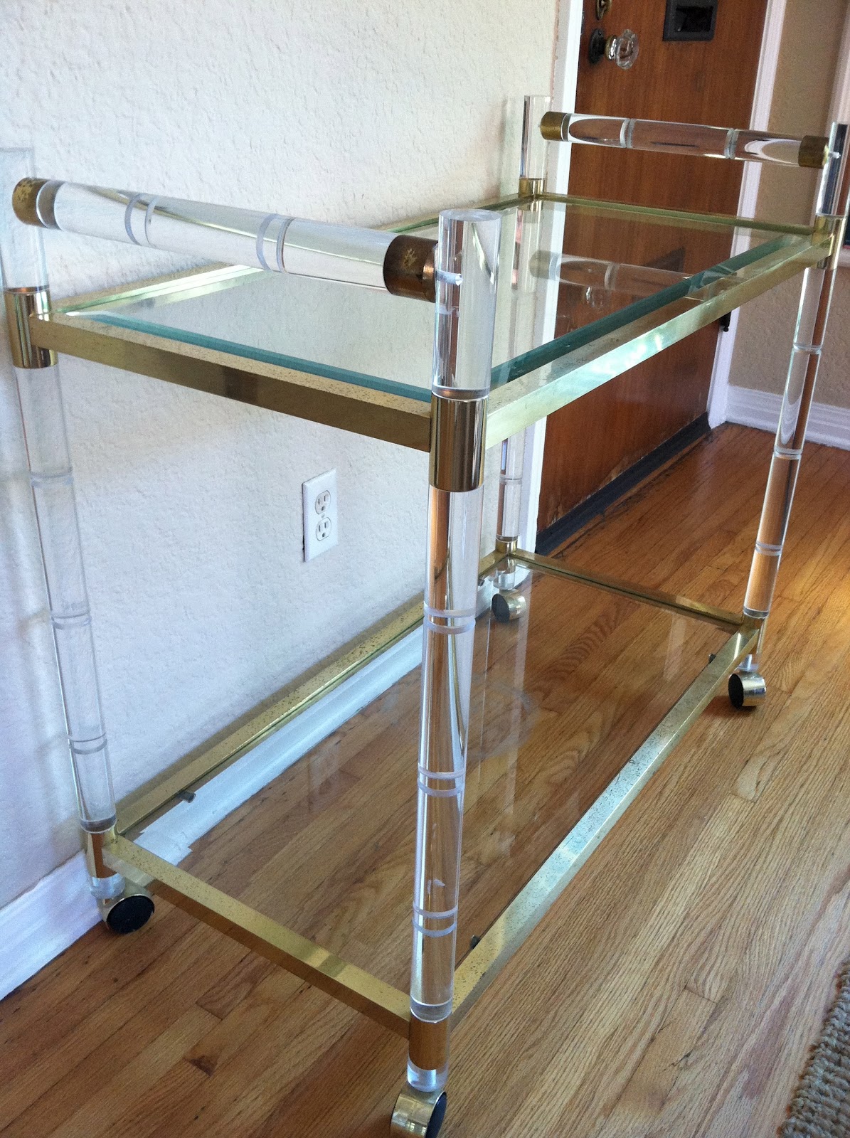 the treehouse 9.6.12 lucite, glass and brass bar cart