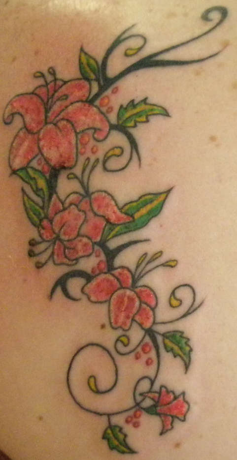 Darasha Lea Kathryn Alise site tattoos calf sun flower rib cage tattoos for