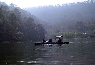 Enjoying boating across one of the lakes at Sattal, India