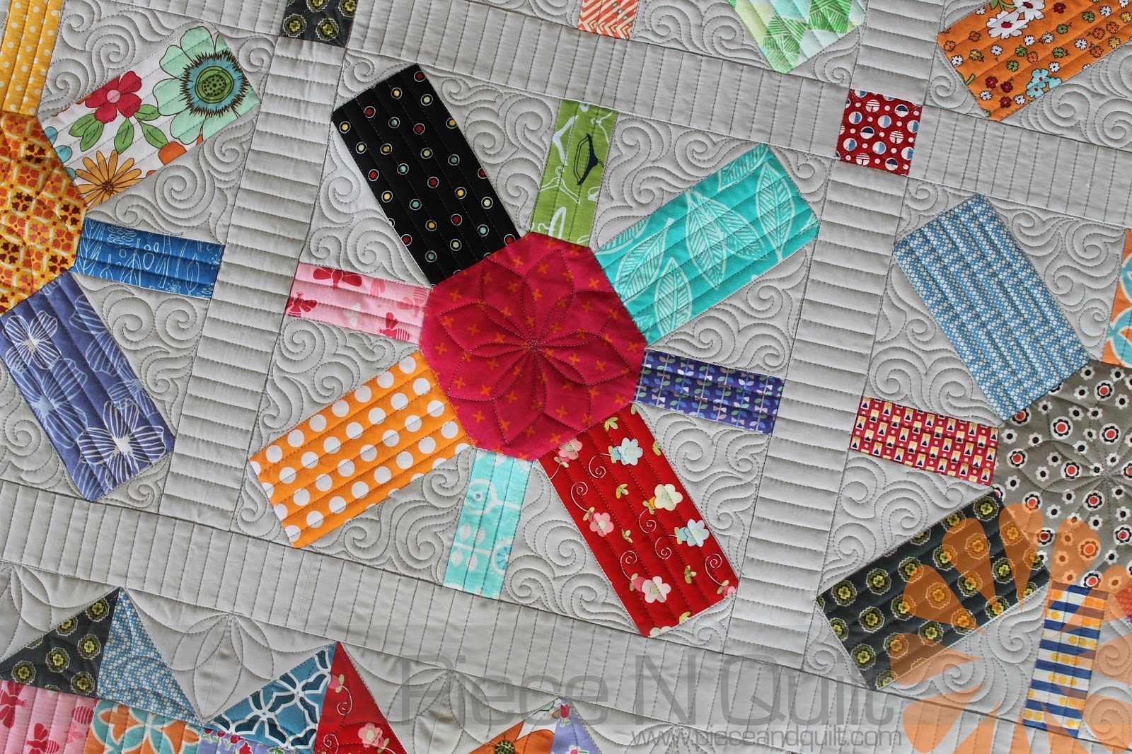 Piece N Quilt Scrappy Quilt Custom Machine Quilting by Natalia Bonner