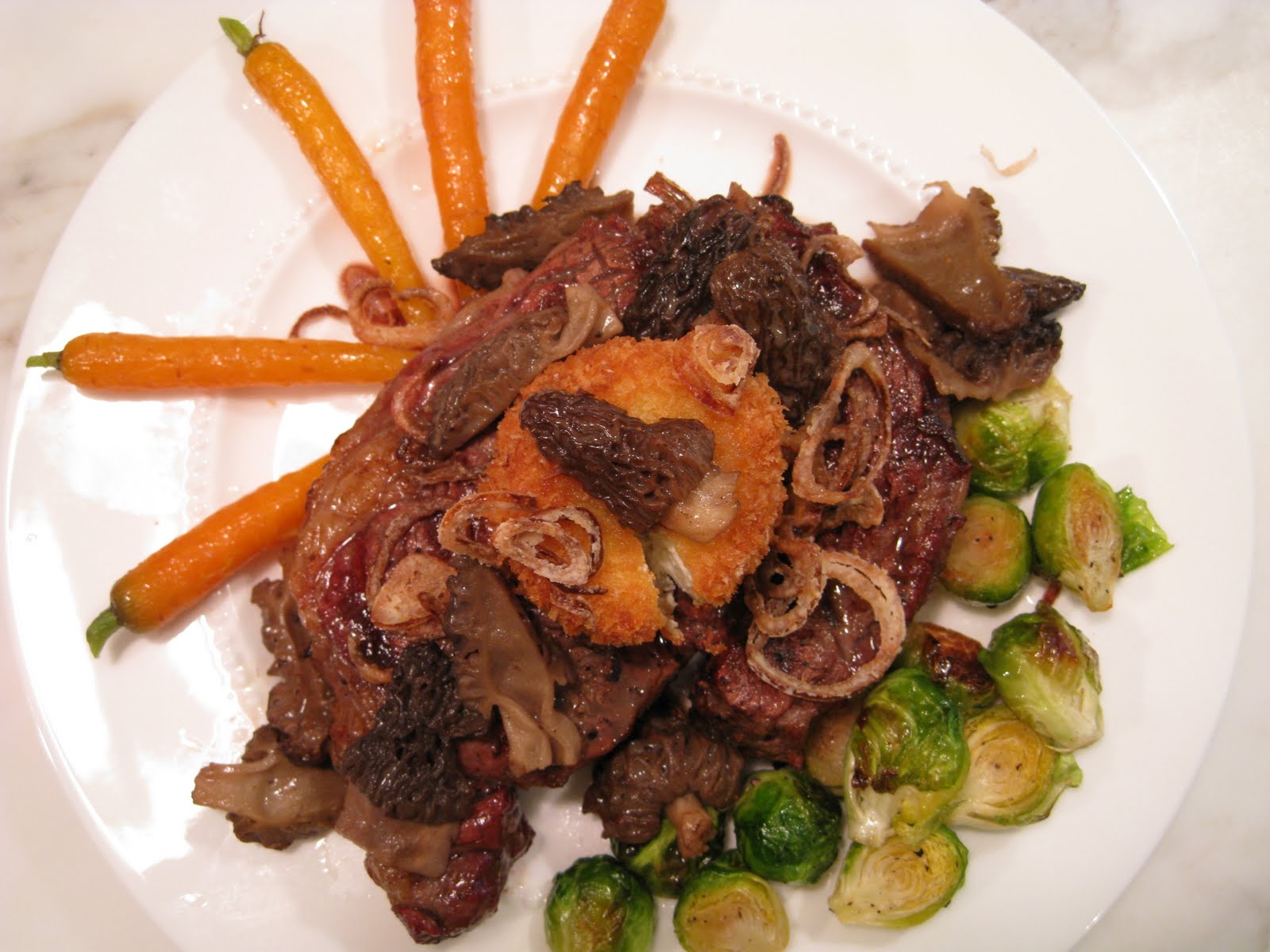 Grilled Ribeye Steaks, Fired Goat Cheese, Crispy Shallots and Fresh Morels