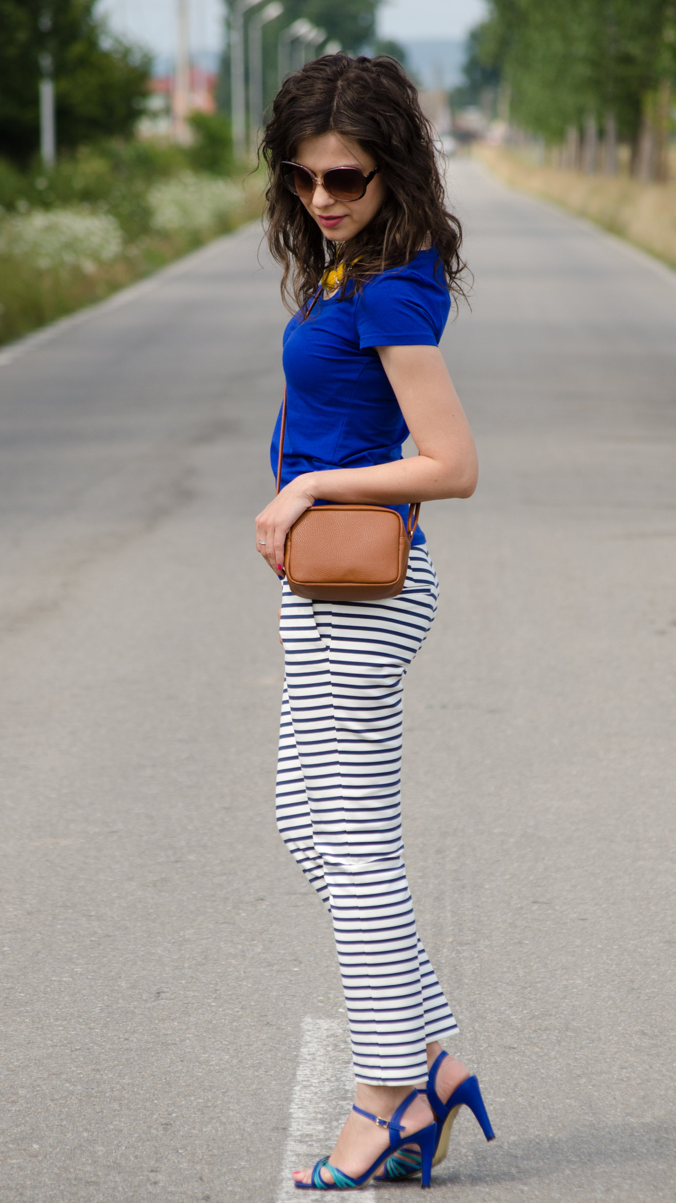 zara navy stripes pants H&M blue t-shirt brown satchel mustard statement necklace poema