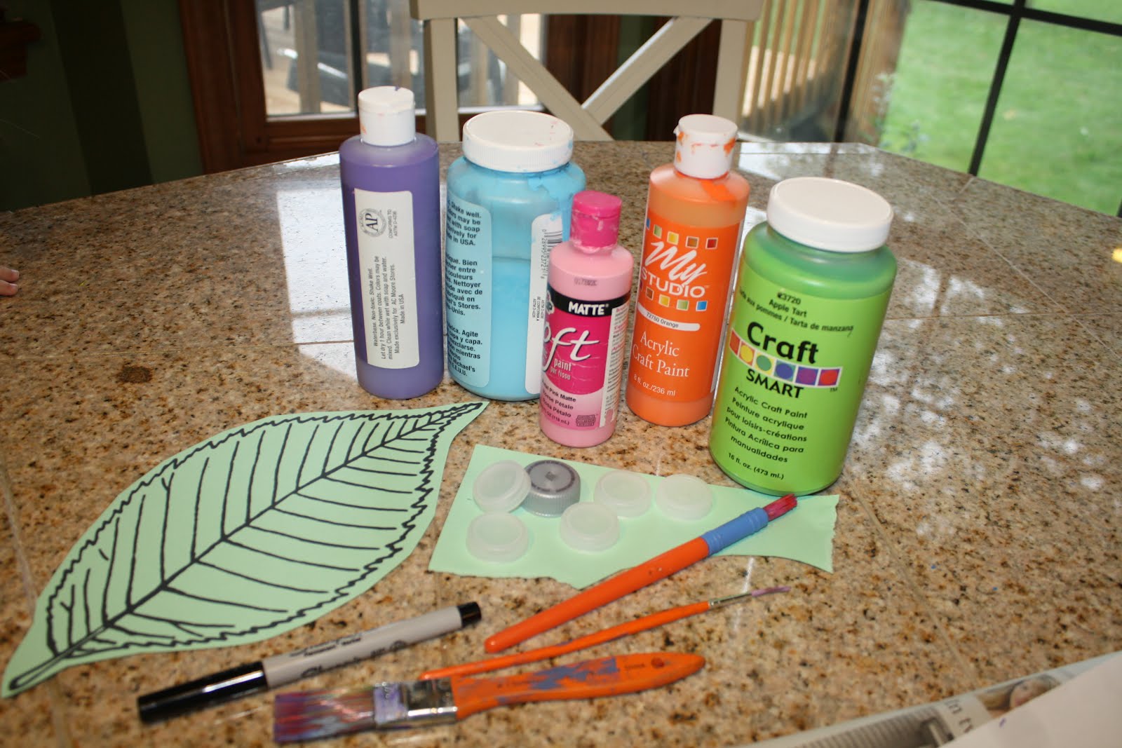 The Laber Family C is for Caterpillar Caterpillar Bottle Cap Craft by Maya