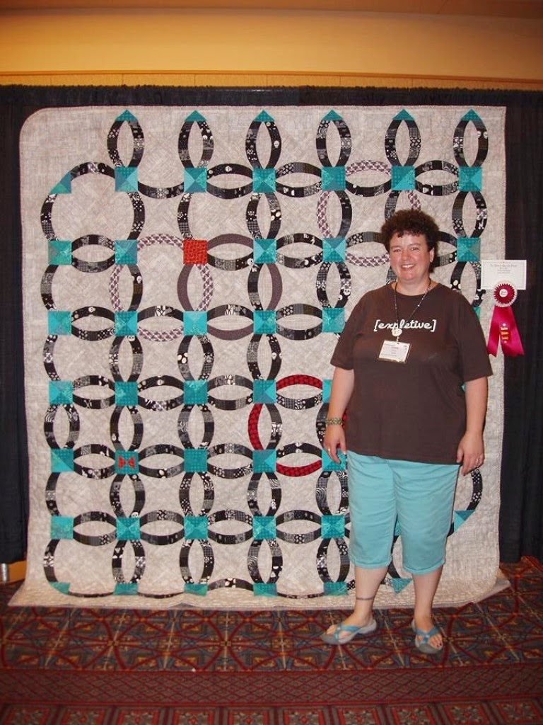 I quilted Trisha's Wedding Ring Quilt