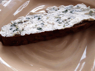 Delicious bread spread using the curd cheese with chives and garlic