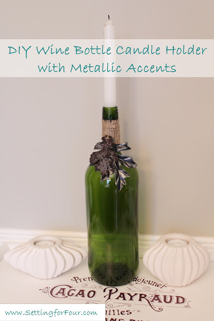 See how to make this quick and easy wine bottle candle holder! Perfect home decor and entertaining idea for fall tablescapes, holiday tables, weddings and outdoor living areas. 