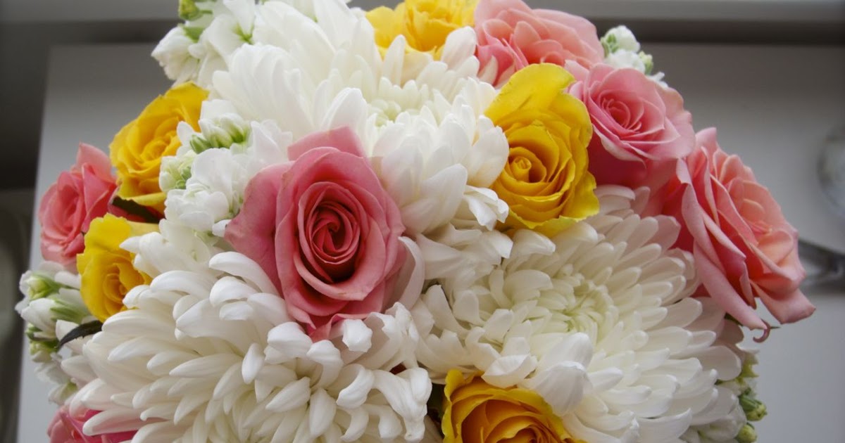 The Flower Girl Blog white, coral, and yellow bridal bouquet