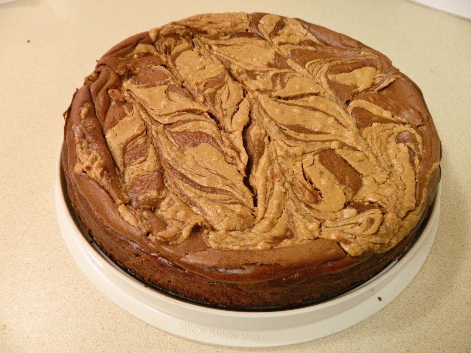 Ginny's Low Carb Kitchen CHOCOLATE AND PEANUT BUTTER SWIRL CHEESECAKE