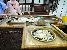 Boiling silk cocoons for carpet in Turkey