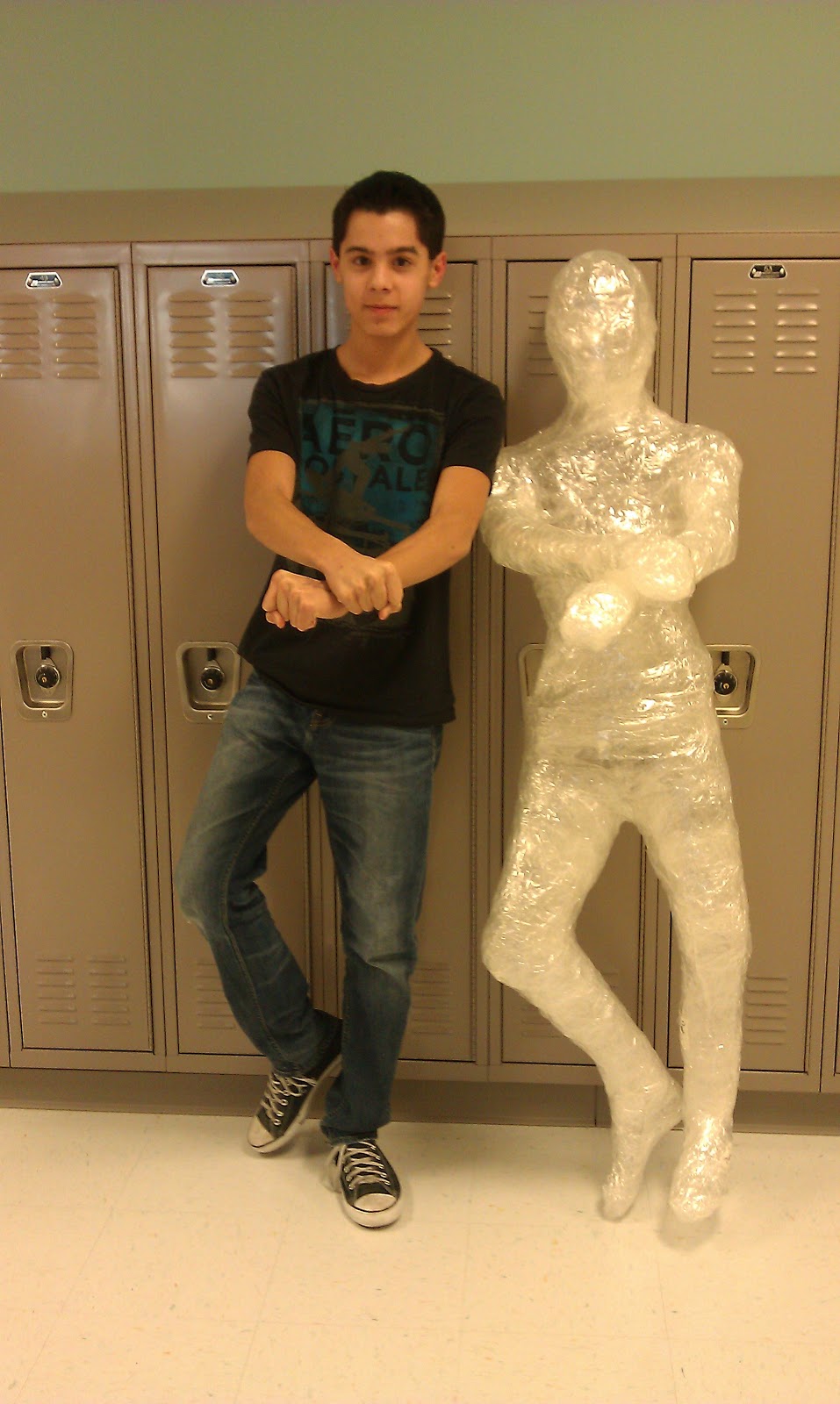 Art with Ms. Lloyd Art Club Packing Tape Sculptures