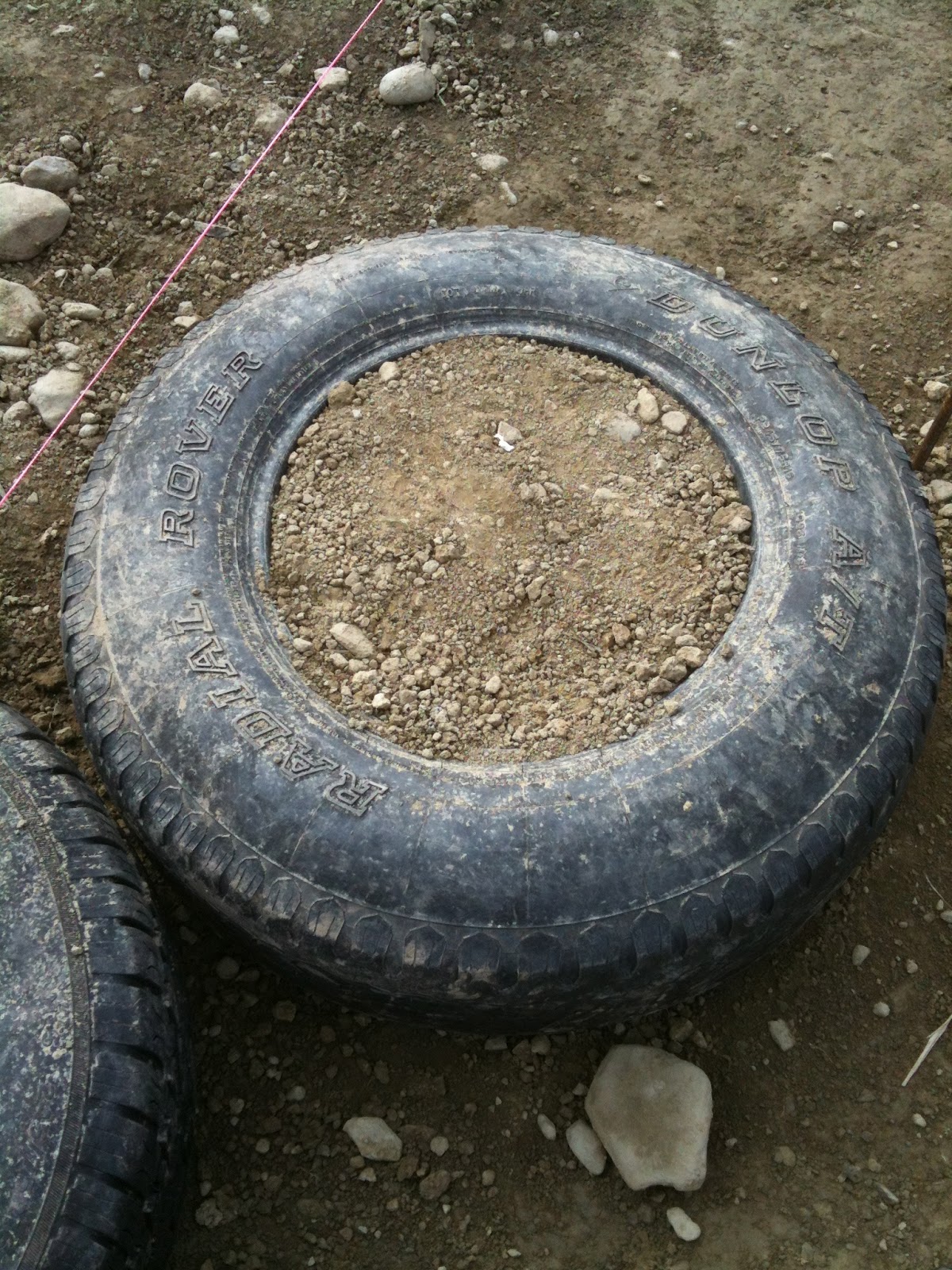 The Freeville Earthship The First Tire!