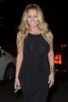 Aubrey O'Day at Bootsy Bellows wearing a tight black dress