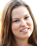 A head shot of Dr. Jamie O'Mally, looking at the camera and smiling