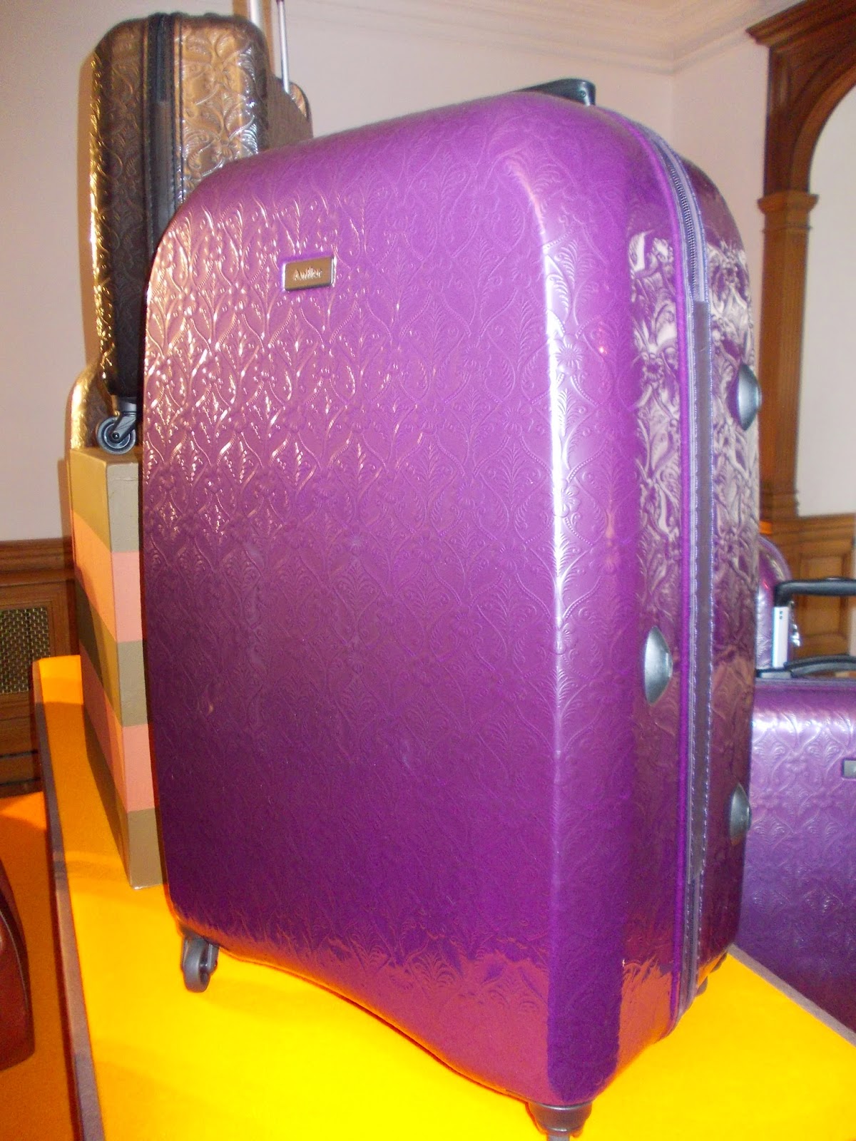 antler suitcase purple