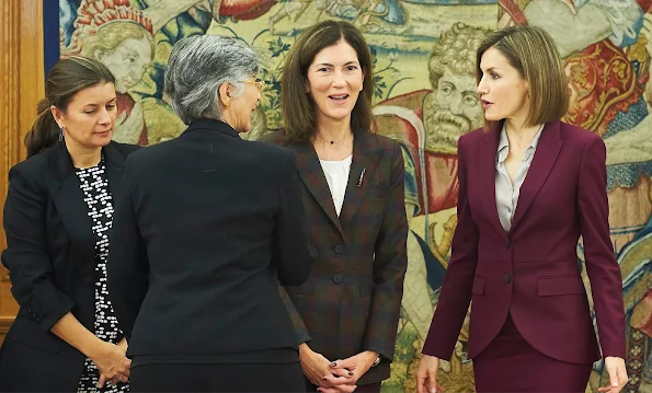 Queen Letizia of Spain attends several audiences at Zarzuela Palace, HUGO BOSS Bedina blouse, Carolina Herrera python pumps, Hugo Boss Jamayla  Blazer and Valessima Skirt 