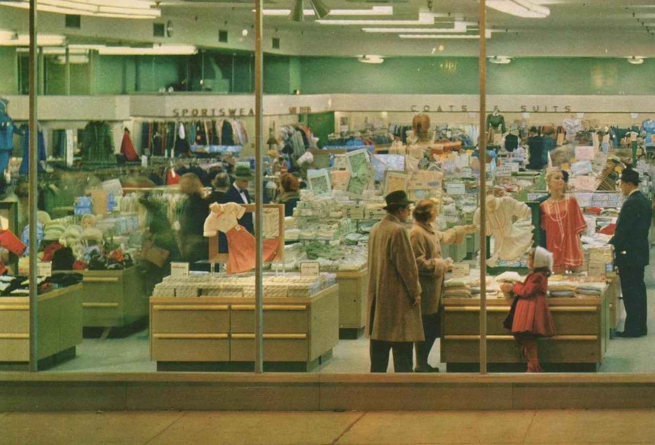 Pleasant Family Shopping A Look Through Penney's Window...