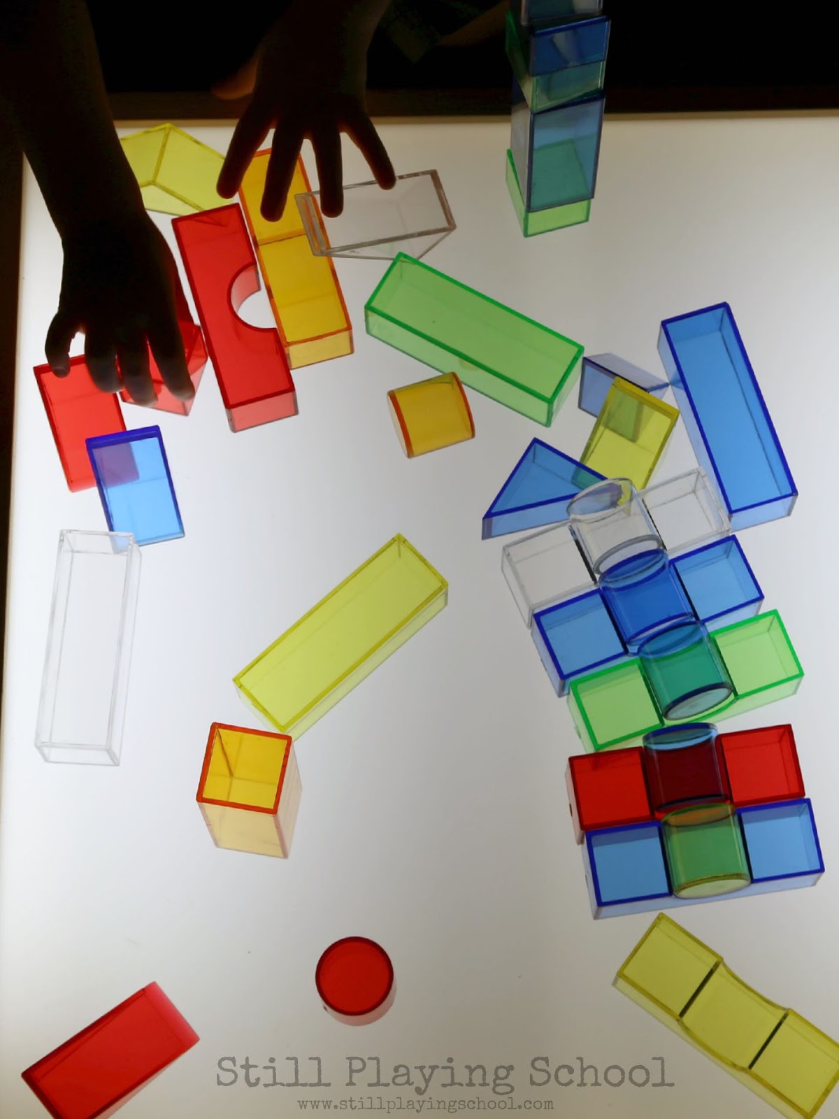 3D Shapes on the Light Table | Still Playing School