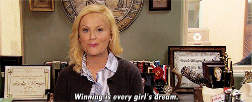 Animated gif of Leslie Knope saying "winning is every girl's dream"