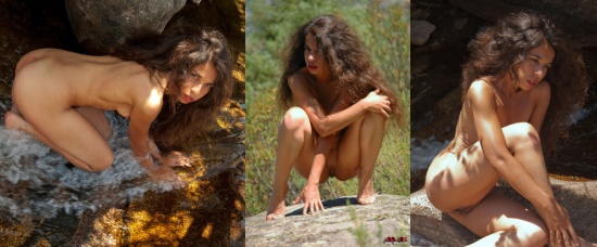 Wild nude brunette in a wild and beautiful landscape