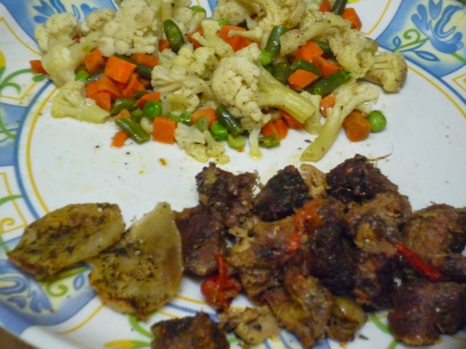 G'Gina's Roasted beef chunks with baked potatoes and buttered steamed veggies