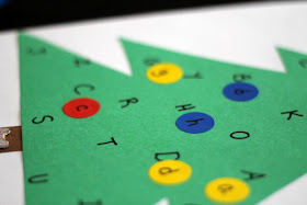Practice letter recognition with this simple Christmas sticker tree Practice letter recognition with this simple Christmas sticker tree