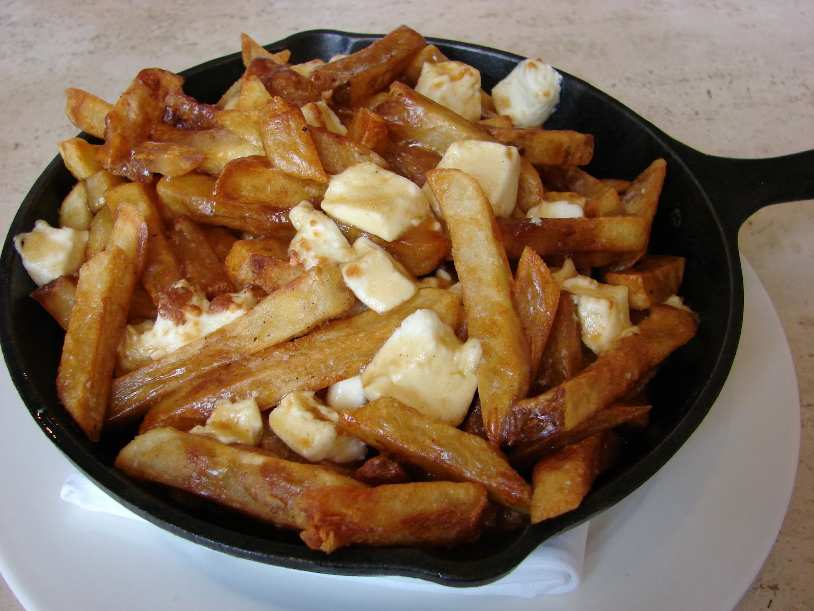 The Taste of Travel Making Truffled Poutine