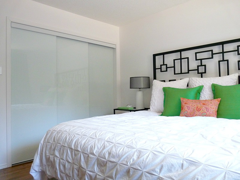 New White Glass Sliding Closet Doors in the Bedroom!