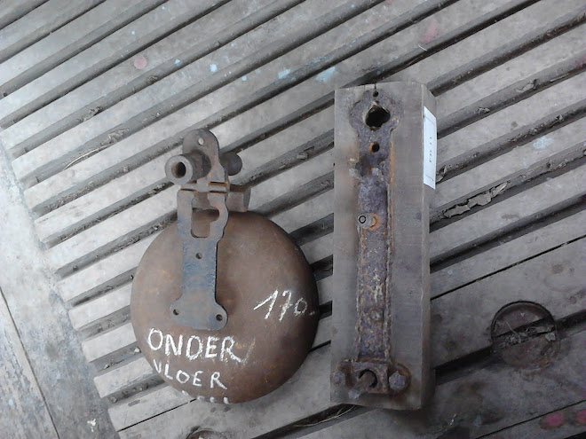 Our new foot bell next to the original 53 bell holder.
