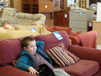 relaxing on sofa in furniture shop