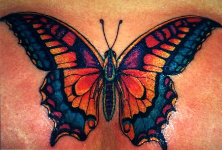Above The artist has included tiny details in this butterfly tattoo design 