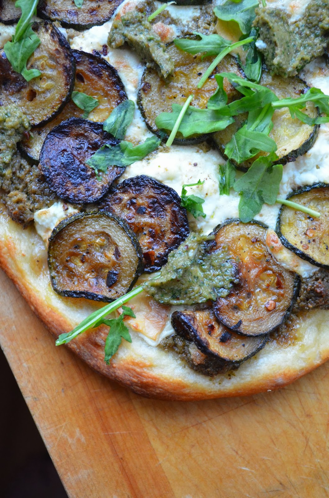 amour fou(d) sauteed zucchini pizza with walnut pesto and ricotta.