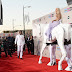 Is that Lady Ga-Godiva? Gaga makes an entrance (but keeps her clothes on) as she gallops into the American Music Awards atop a huge fake white horse