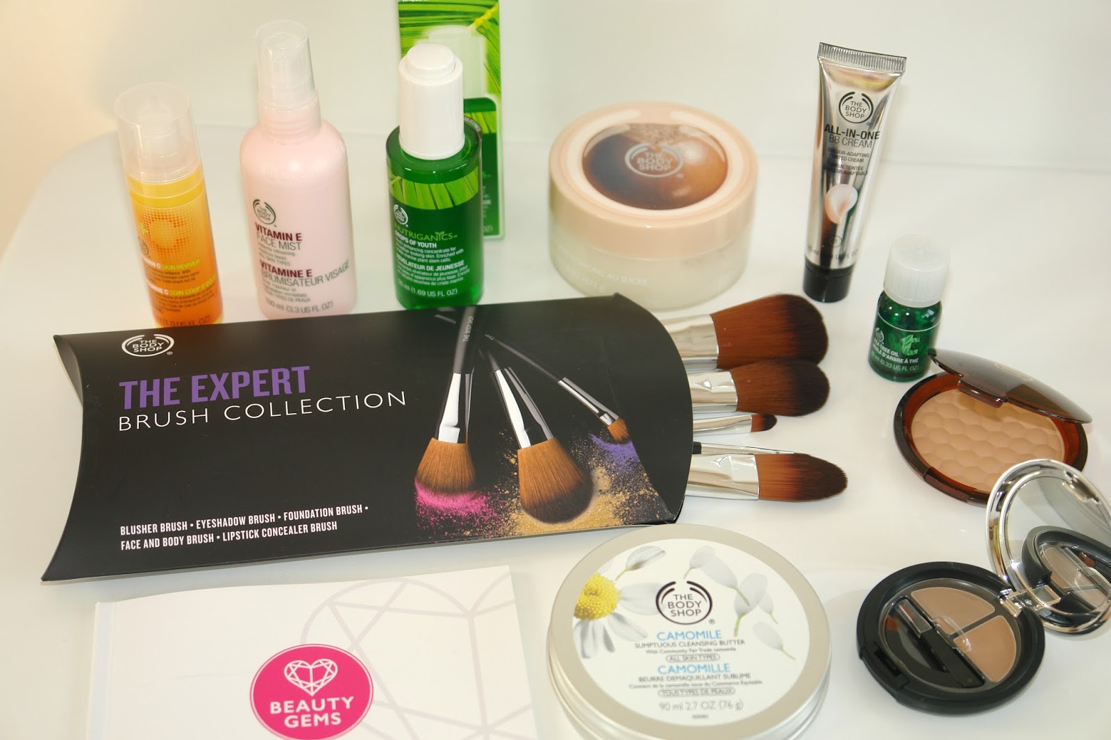 The Body Shop Beauty Gems, beauty, review, The Body Shop, The Body Shop Nutriganics Drops of Youth, The Body Shop Vitamin C Skin Reviver, The Body Shop Vitamin E Face Mist, The Body Shop Camomile Sumptous Cleansing Balm, The Body Shop Tea Tree Oil, The Body Shop All-In-One BB Cream, The Body Shop Brow & Liner Kit, The Body Shop Honey Bronze Bronzing Powder , The Body Shop Make up Brushes, The Body Shop Shea Body Scrub