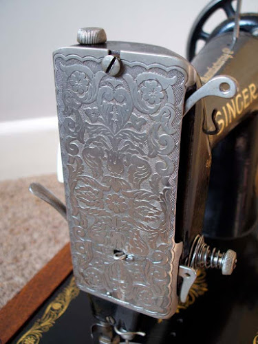 Vintage love: early twentieth century cast iron black Singer sewing machine