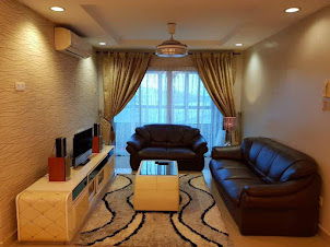 living area with leather sofa set