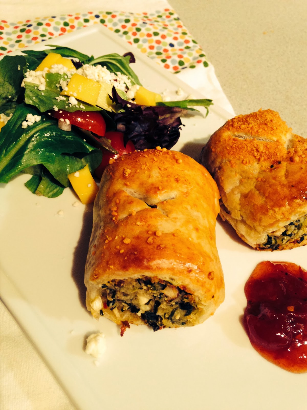 Sweet Alchemy Pork, spinach, feta and pear sausage rolls.