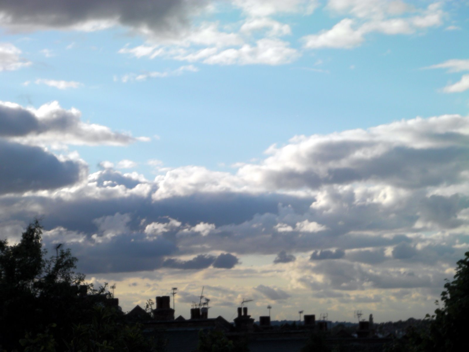 The Willesden Herald Grey clouds, white clouds