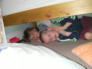 kids making den under bed