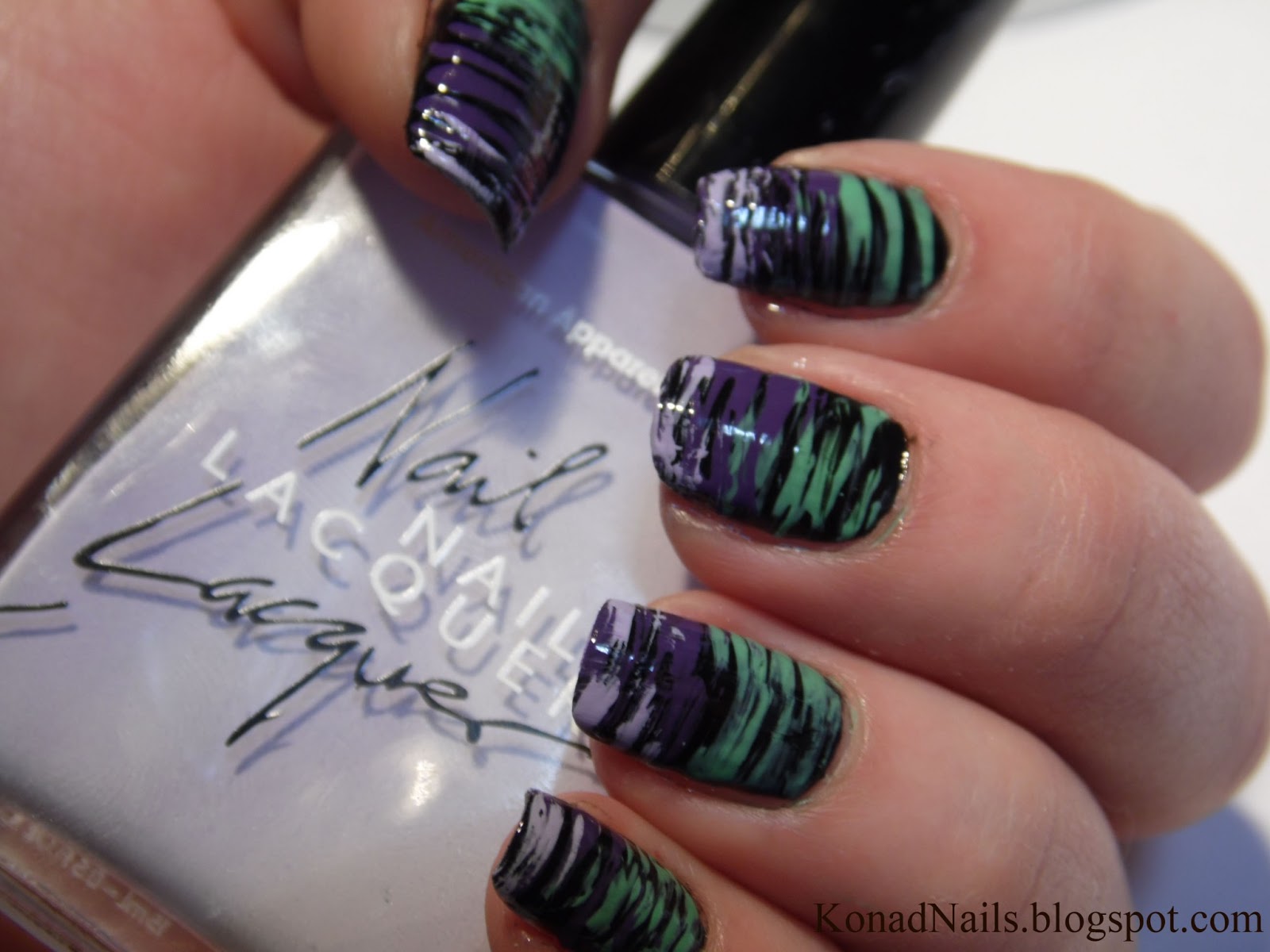 Konad Addict Striped nail art using fan brush