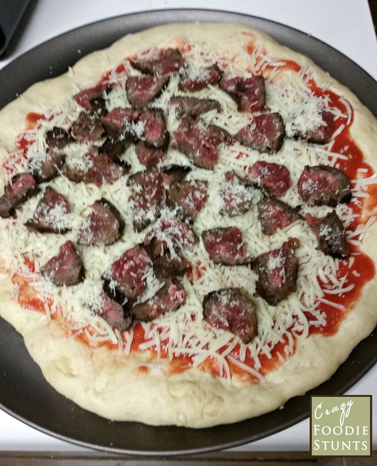 Crazy Foodie Stunts Balsamic Steak and Arugula Pizza for a National