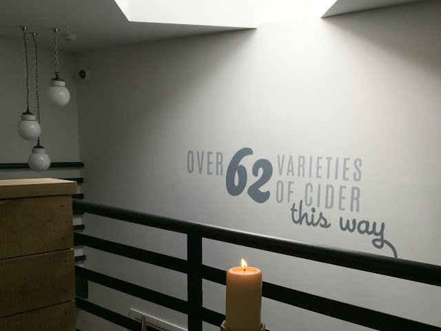 Sign writing on staircase advertising ciders