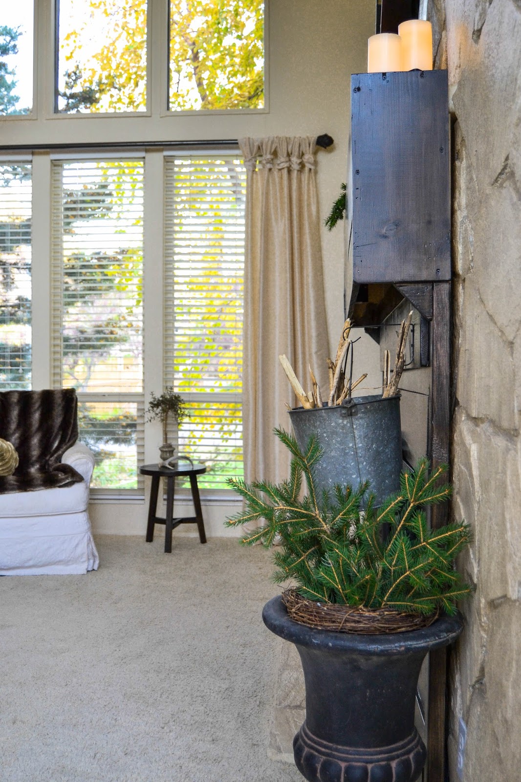 Down to Earth Style Make an Off Centered Fireplace Visually Symmetrical