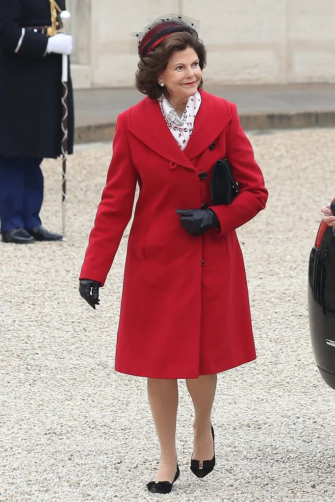 Sweden's King Carl XVI Gustaf (L) and Queen Silvia attend the art installation 'Northern Light' by Swedish artist Aleksandra Stratimirovic, at the Palais Royal garden in Paris